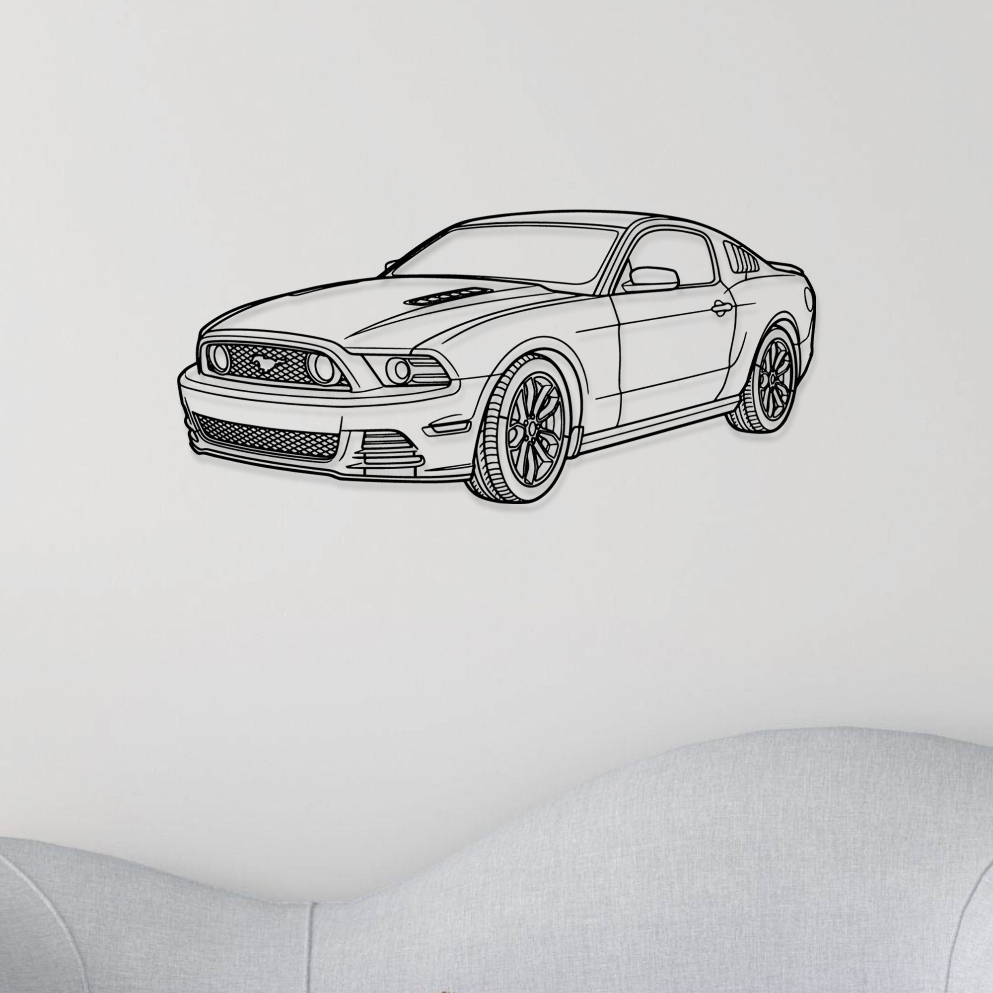 Modern black metal Mustang GT art on white wall.