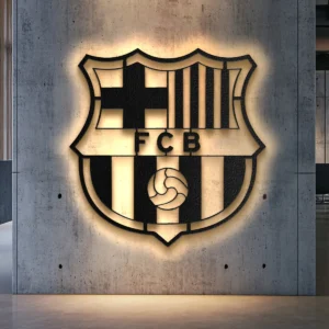 Black metal Barcelona FC crest wall art with warm LED backlighting.