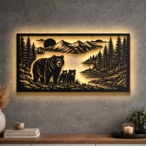 A large rustic metal wall art depicting a bear family in a forest scene with mountains and a lake.