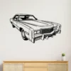 Black metal Cadillac Eldorado wall art on a white wall.