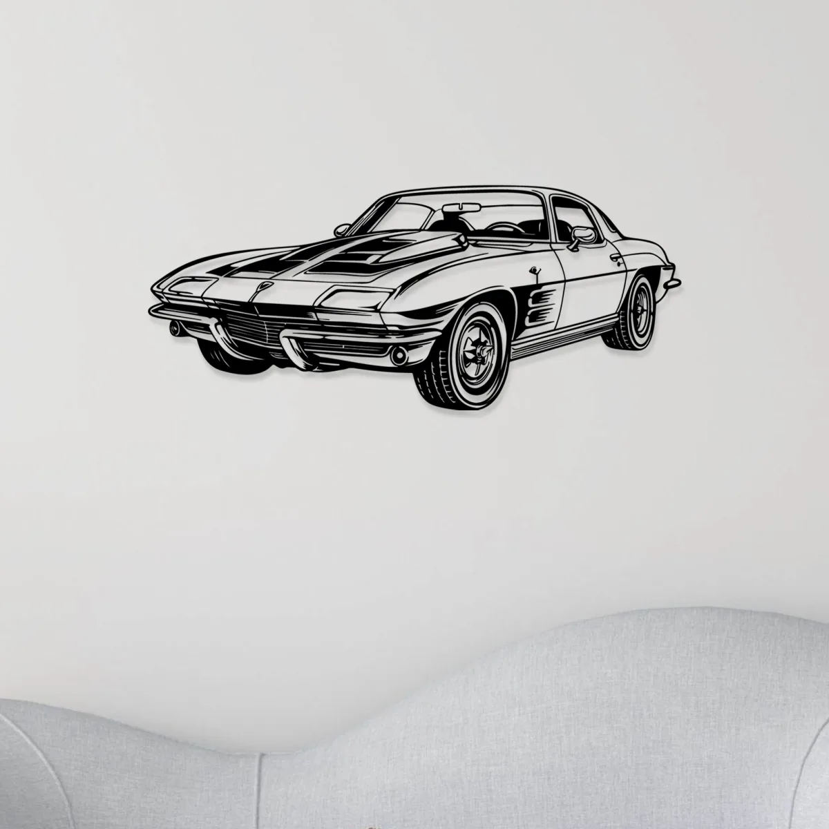 Automotive themed metal art featuring a vintage Corvette C2