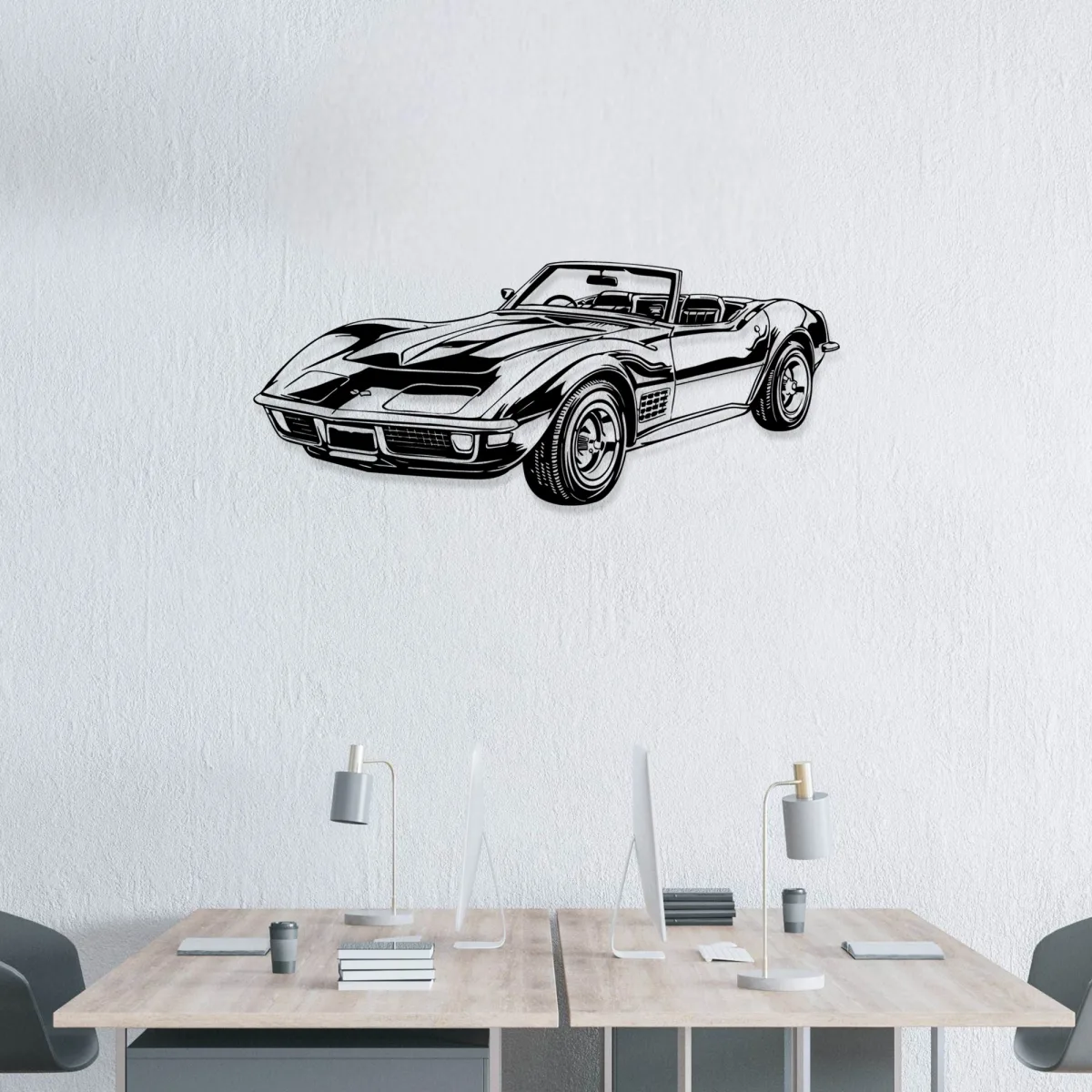 Corvette C3 metal sign creating a 3D shadow effect on a white wall