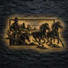 An oversized rustic metal wall art featuring a cowboy riding a horse with other horses running in a desert scene.