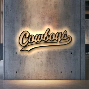 Black metal Dallas Cowboys script logo wall art with bright LED backlight.