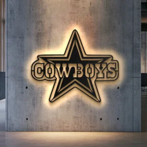 Black metal Dallas Cowboys star logo wall art with bright LED backlight on a concrete wall.
