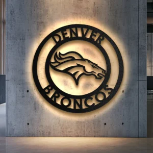 Black metal Denver Broncos logo wall art with warm LED backlight.