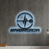 Black metal Energica logo wall art with blue LED backlighting.