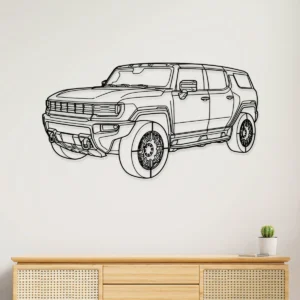 GMC Hummer EV metal wall art silhouette hanging on a white wall