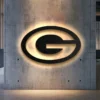 Green Bay Packers metal logo wall art with LED backlighting.