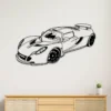Black metal Hennessey Venom GT silhouette wall art on white wall.