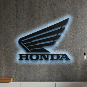 Black metal Honda logo wall art with blue LED backlight on a concrete wall.