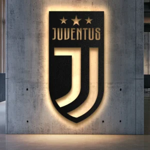 Black metal Juventus logo wall art with warm LED backlighting.