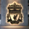 Black metal Liverpool FC logo wall art with "You'll Never Walk Alone" motto.
