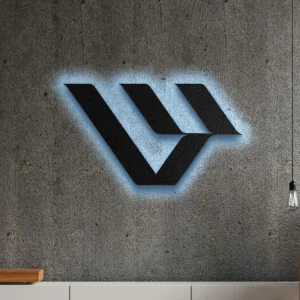 Black metal Livewire logo wall art with blue LED backlight on a concrete wall.