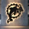 Black metal Miami Dolphins logo wall art with bright LED backlight