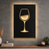 Oversized minimalist wine glass metal wall art with LED backlight.