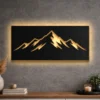 A large rustic metal mountain range silhouette wall art with warm LED backlighting.