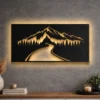 A large rustic metal wall art featuring a mountain road and forest scene.