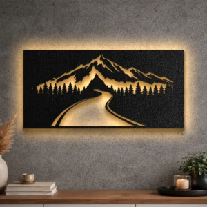 A large rustic metal wall art featuring a mountain road and forest scene