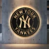 New York Yankees metal logo wall art with golden finish.