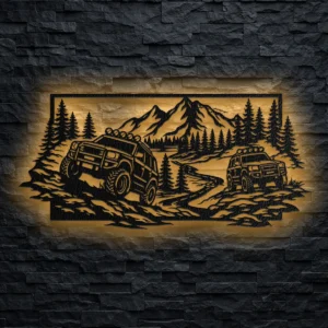 A stunning oversized metal wall art featuring two off road trucks in a rustic mountain forest scene