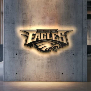 Black metal Philadelphia Eagles logo wall art with warm LED backlight.