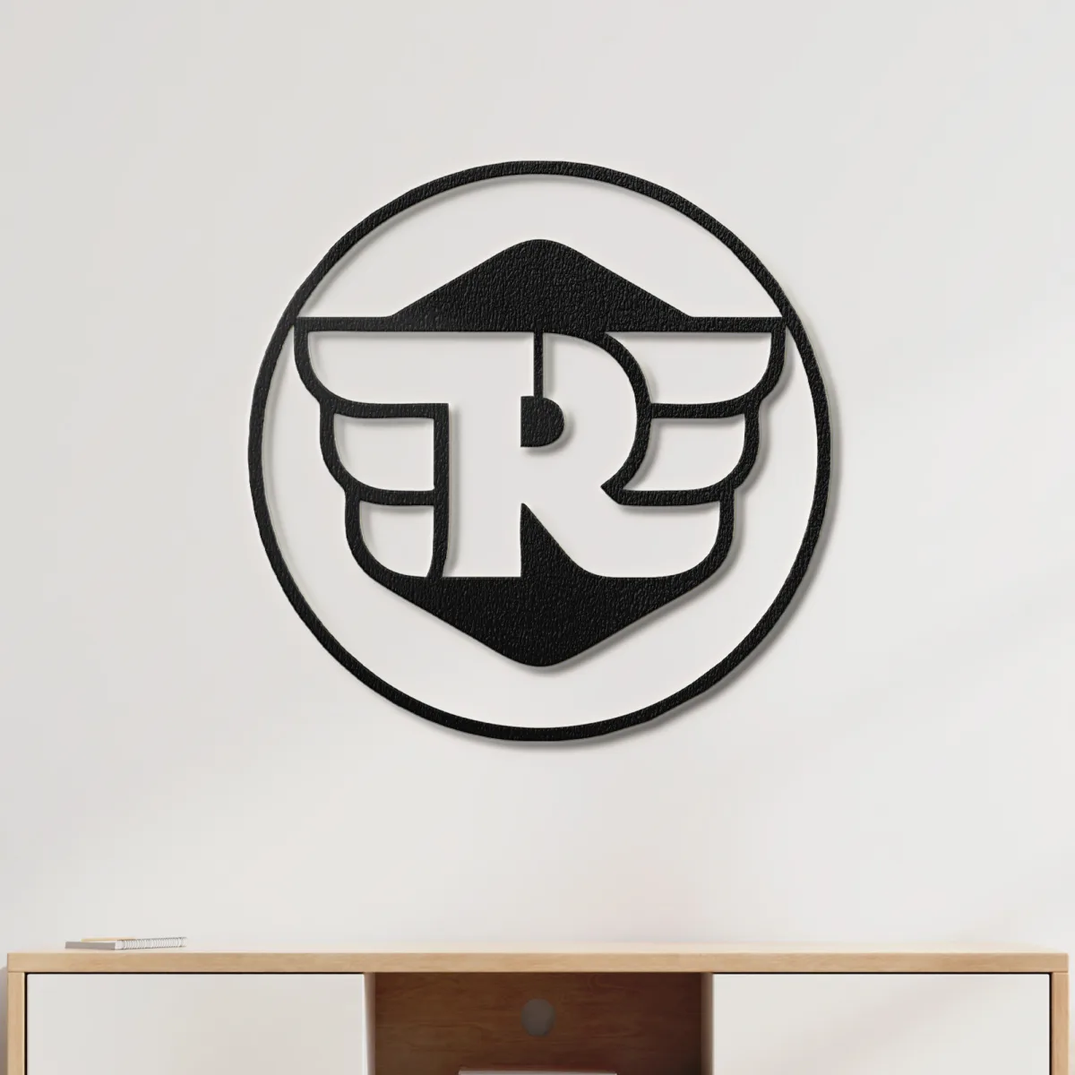 Detailed view of the laser cut metal Royal Enfield sign with 3D shadow effect