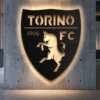 Torino FC metal logo sign with golden details and LED backlighting.