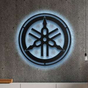 Black metal Yamaha logo wall art with blue LED backlight