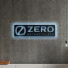 Black metal Zero Motorcycles logo wall art with blue LED backlighting on a concrete wall.