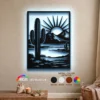 A black metal wall art piece showing a desert cactus sunset, illuminated with a cool white LED backlight in a cozy living room.